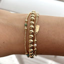 Four split pearl gold coloured
